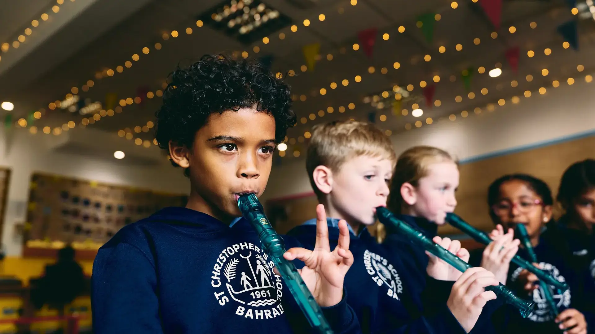 Students playing recorders